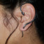 Serpentine coil snake stud earring wrapping along ear, adjustable design for pierced ears, sold individually