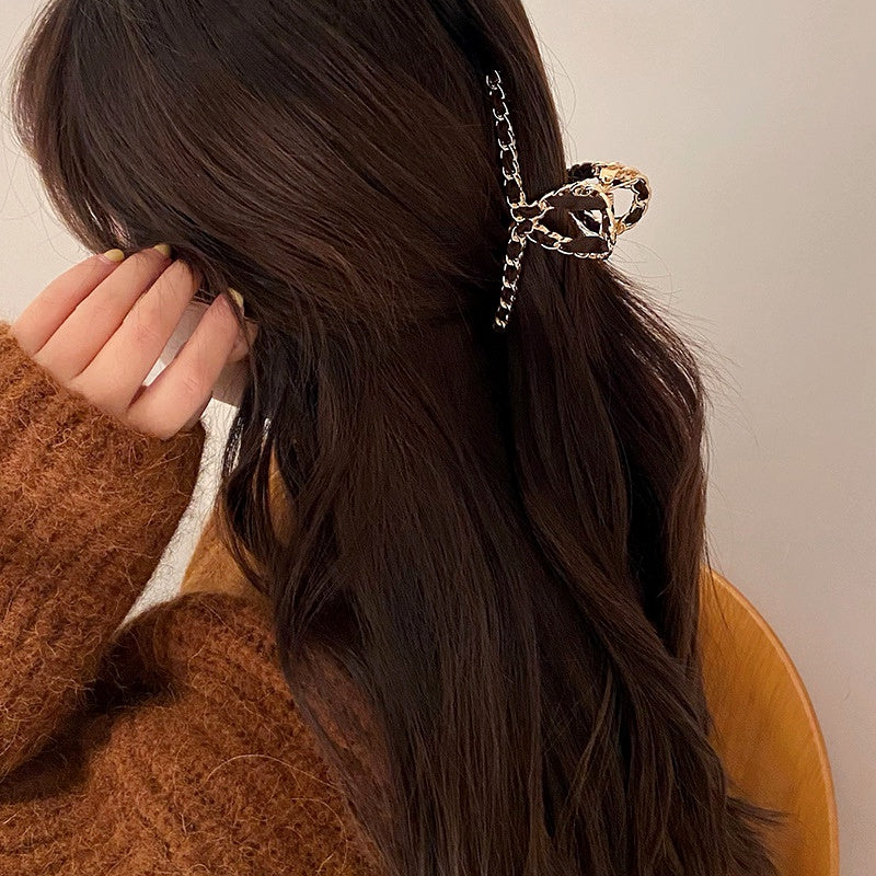 chic gold chain hair claw clips in red or brown. Stylish, secure & versatile- elevate any hairstyle with this trendy Ella Etc ACCESSORY
